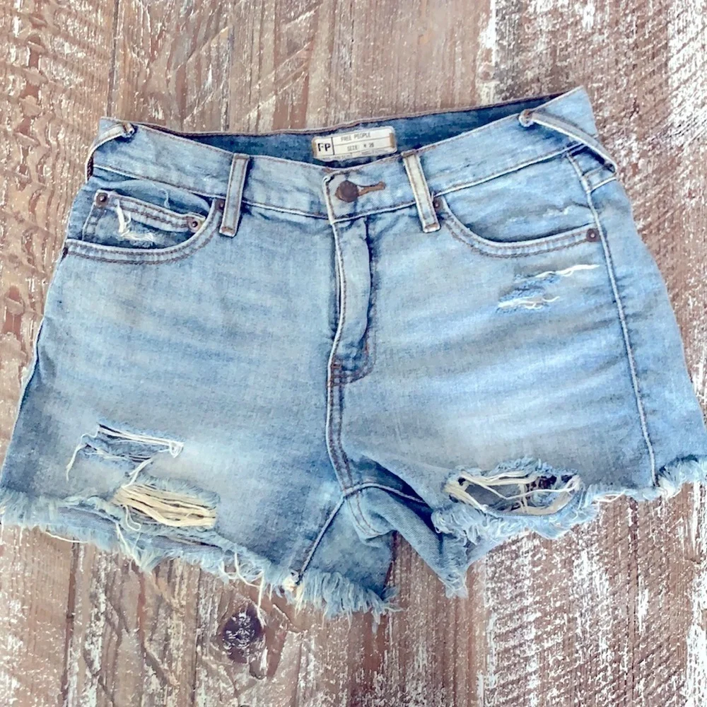 Free People distressed denim shorts